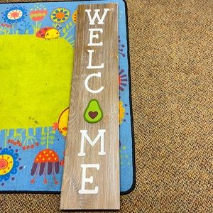 Hanging welcome sign